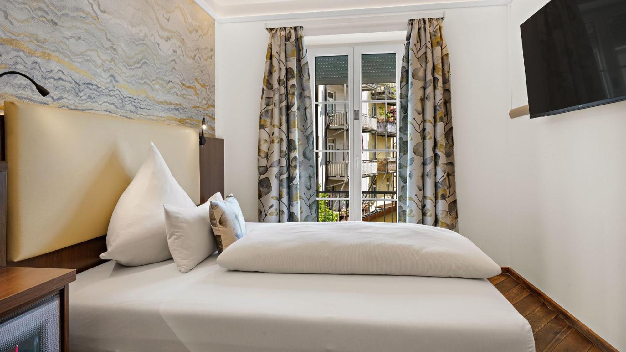 Hotel Deutsche Eiche Munchen Bagian luar foto